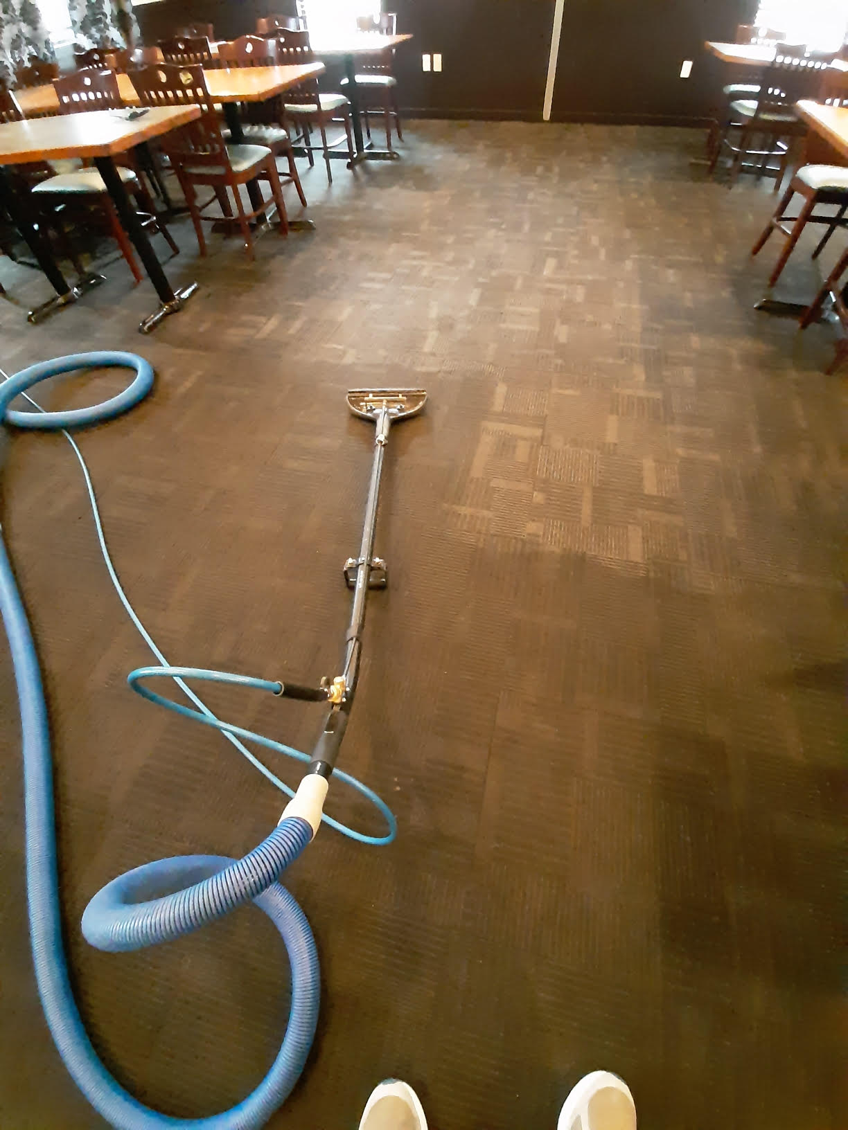 Commercial restaurant carpet cleaning in progress