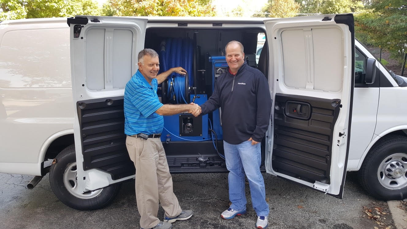 Ajax Carpet Service owner with HydraMaster truckmount